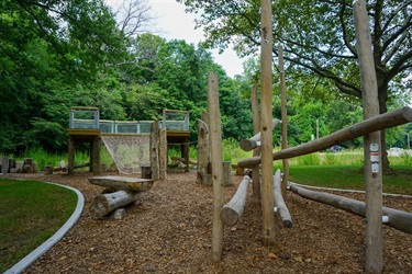 Nature-based playground created using logs and trees