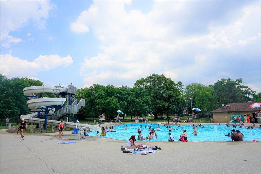 People enjoy MLK park pool with a water slide.