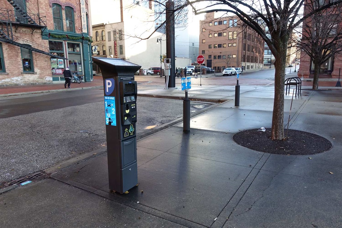JPG of pay station and on-street paid parking in the City of Grand Rapids