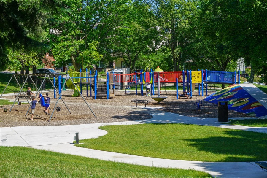 Image of the playground and grassy area at Coit Park