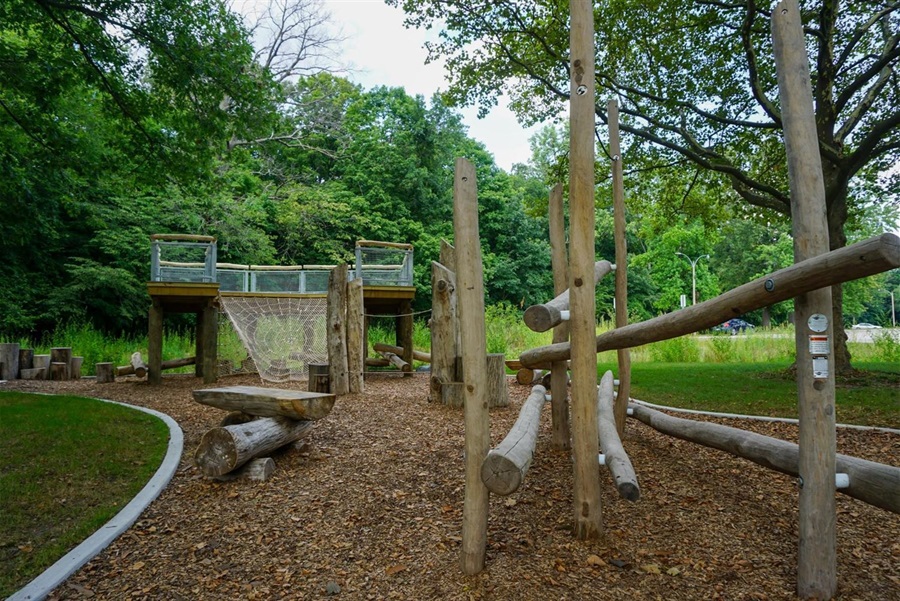 Nature-based playground created using logs and trees