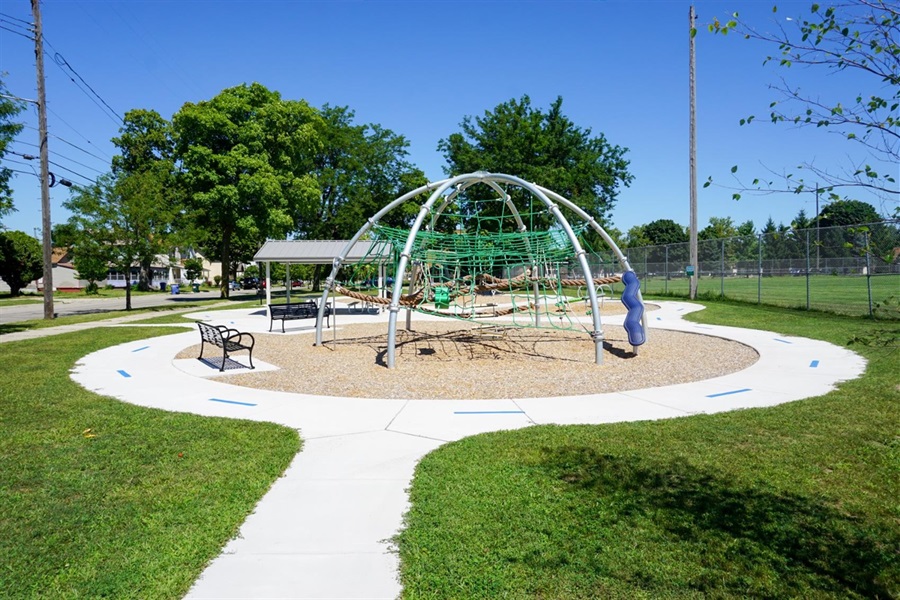 Climbing structure and bench seating at Rasberry Field